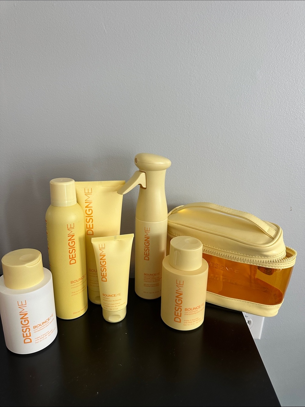 DesignMe shampoo, conditioner, curl mouse and curl balm.